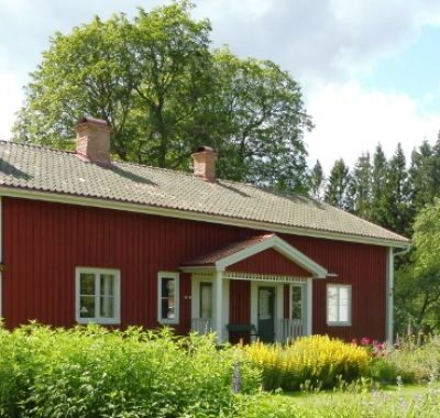 Hus vid sjön Kymmen